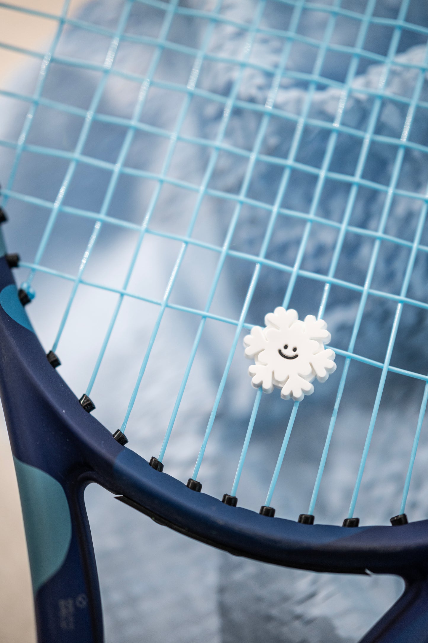 Playful Snow Tennis Racket Dampener - Weather the Game with a Smile