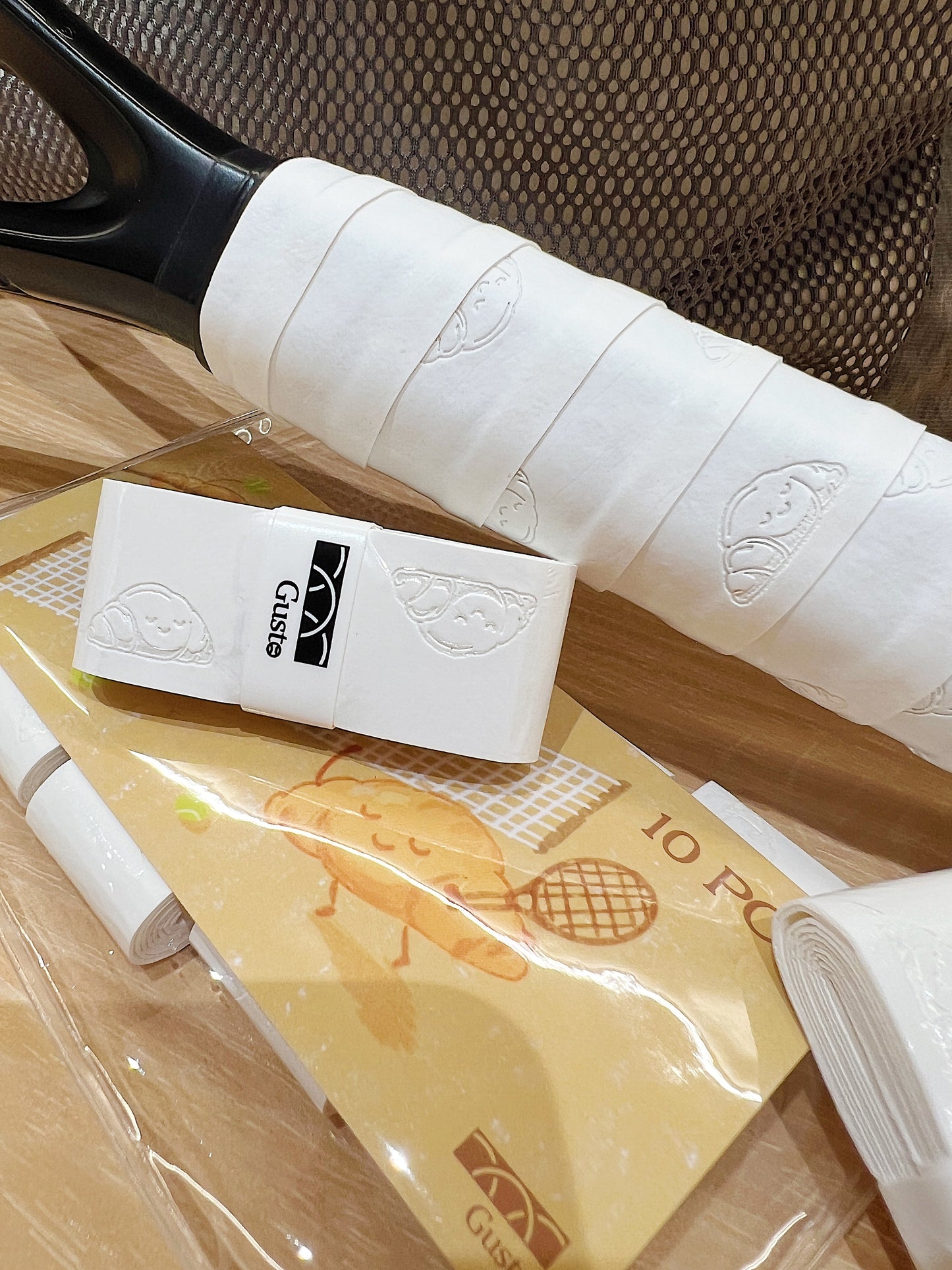 White Croissant Sticky Overgrip Used on Badminton and Pickleball Rackets