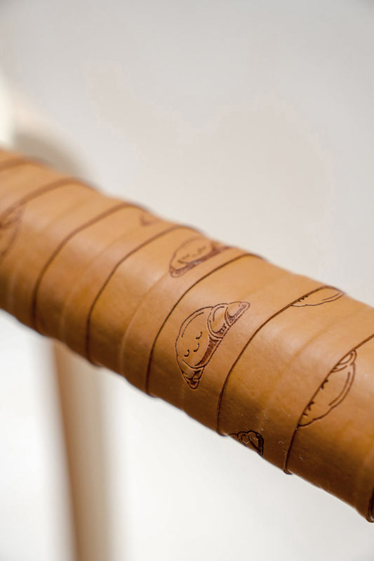 Close-up of Croissant Tennis Overgrip Texture – Sticky PU Surface