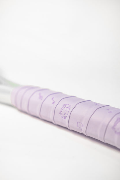 Purple racket grip with playful cat and music note pattern, sticky PU surface.